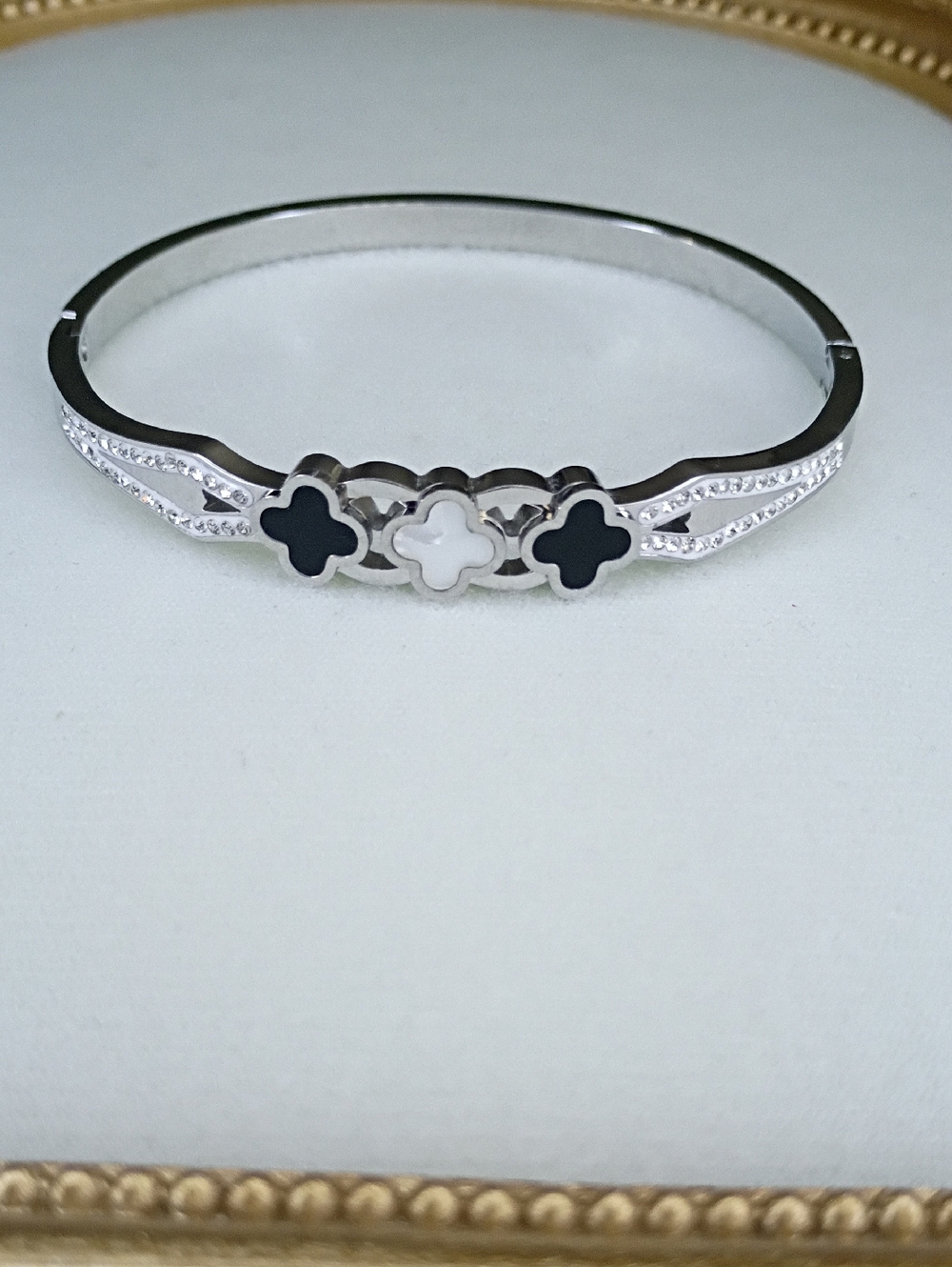 New Silver Tone Bangle Bracelet with Black and White Clover Accents